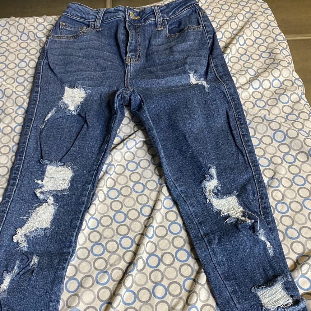 Distressed Blue Jeans